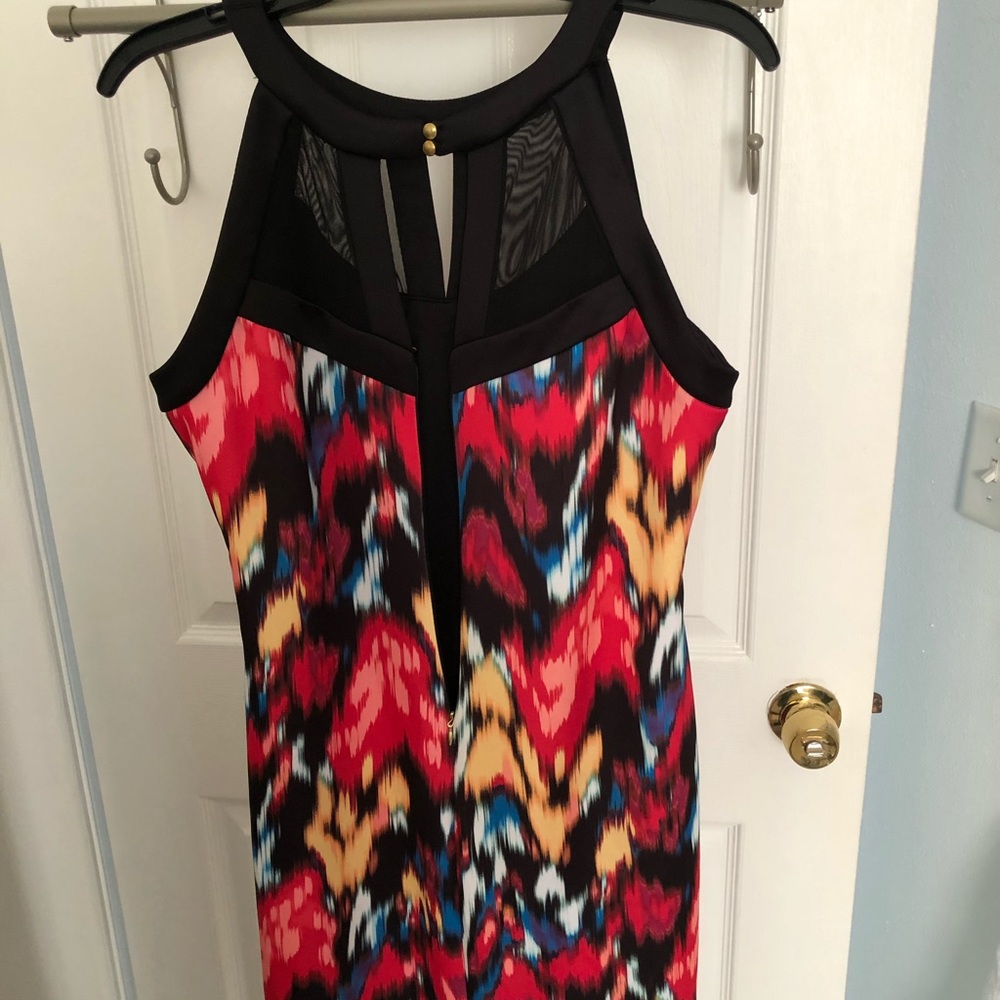 Multi colored Dress with mesh declotage